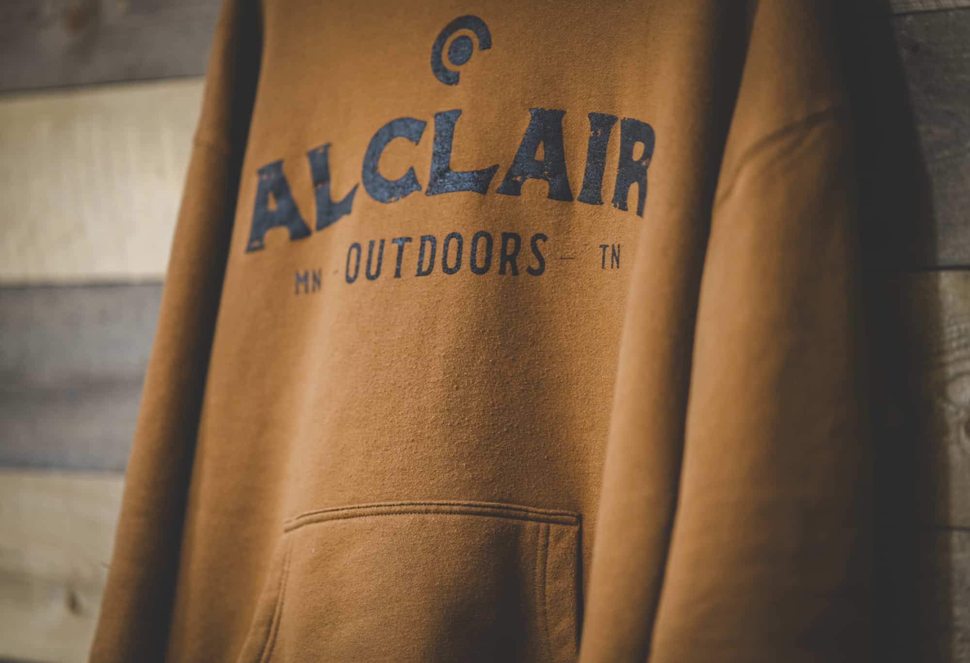 Alclair Audio Merchandise - Hoodie Sweatshirt - Brown Alclair Outdoors - Hanging